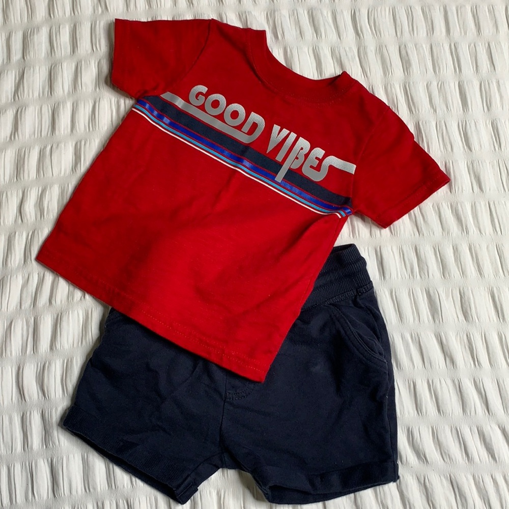 Red Good Vibes tee with blue next.82  shorts